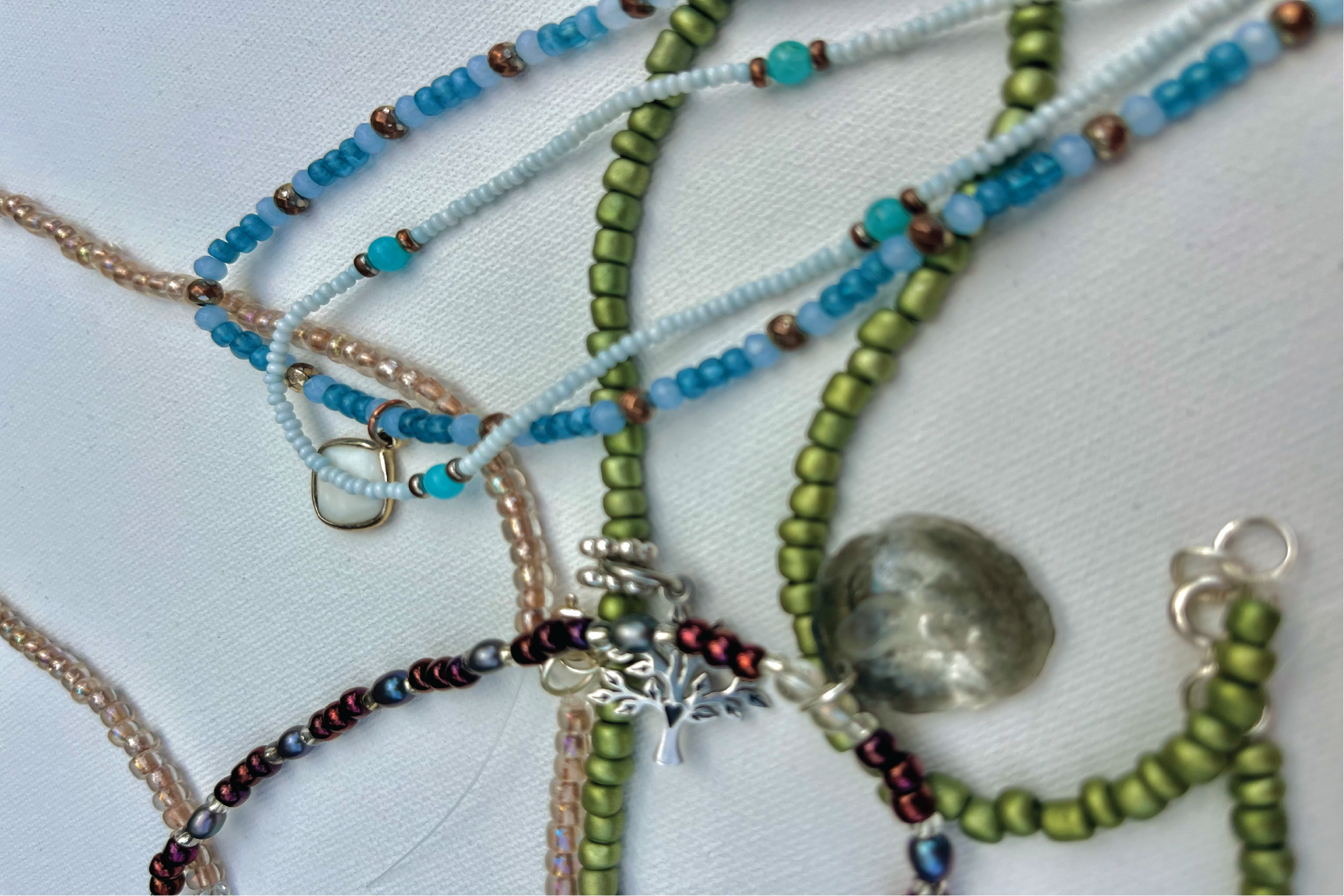 Close up assorted beaded jewelry